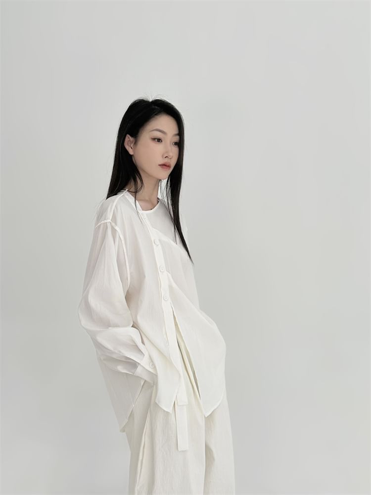 SIMPLE BLACK - Effen asymmetrische blouse