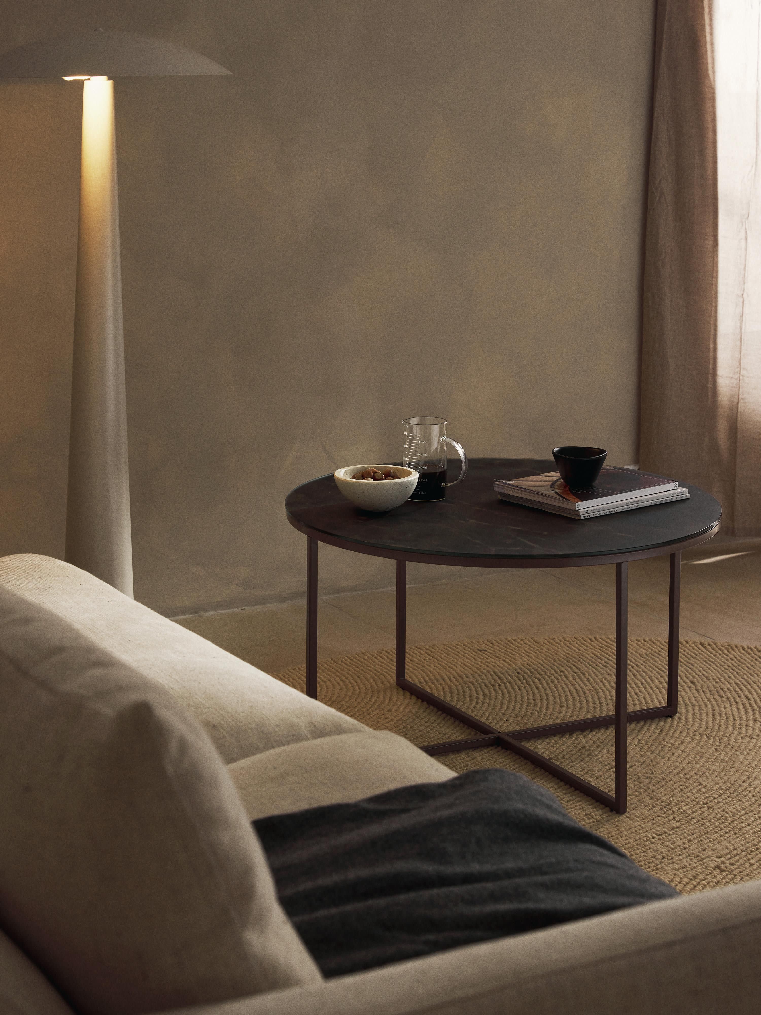 Ronde salontafel Antigua met glazen tafelblad in marmerlook