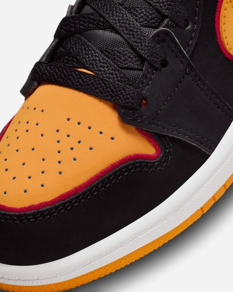 Chaussures Nike Air Jordan 1 Low SE Noir & Orange pour enfant
