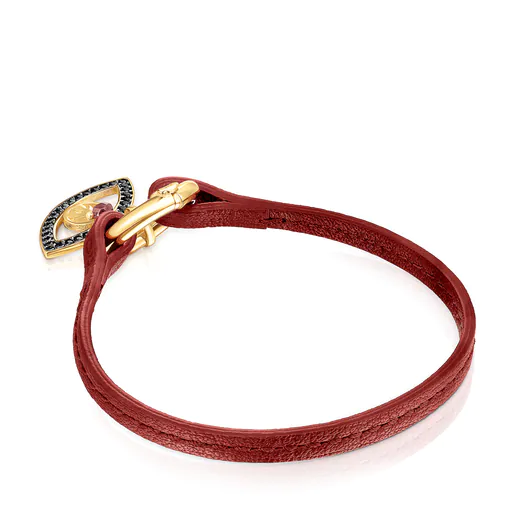 Pulseira TOUS Good Vibes com pingente de olho, banhada a ouro 18k sobre prata, pedras preciosas e couro vermelho.