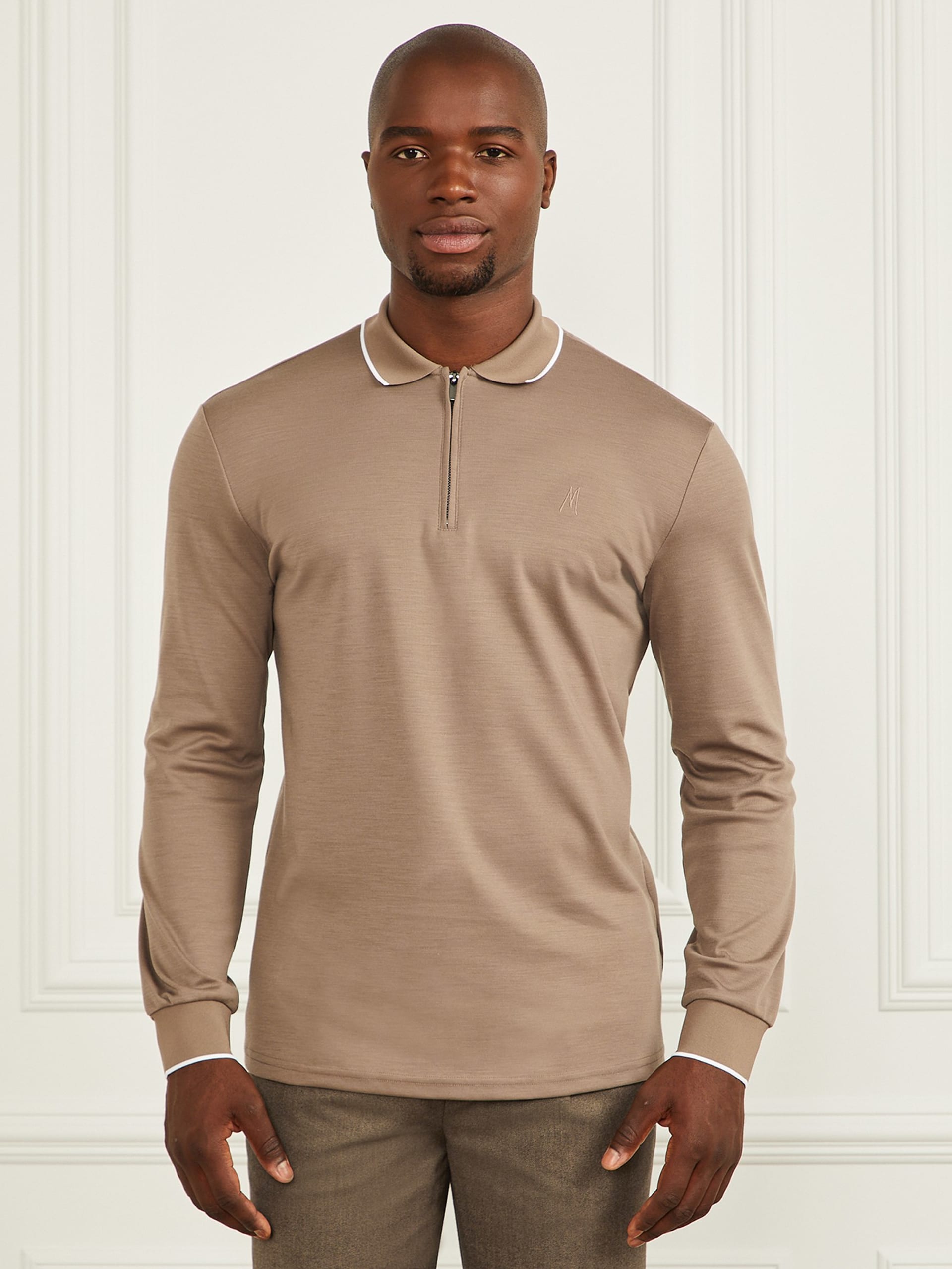 Polo de manga comprida com zíper