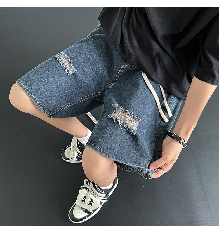 Femilina - Hoge taille denim shorts met distressed effect