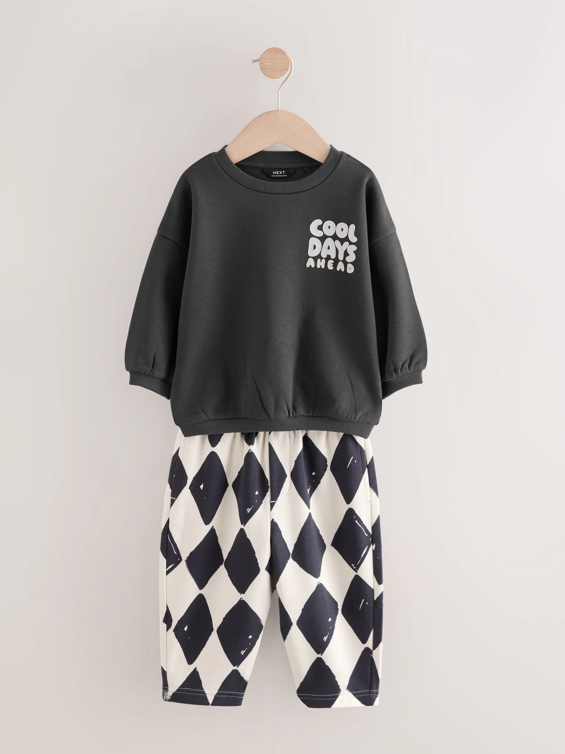 Zwart/wit met print - Set met sweatshirt en joggingbroek met strepen (3mnd-7jr)