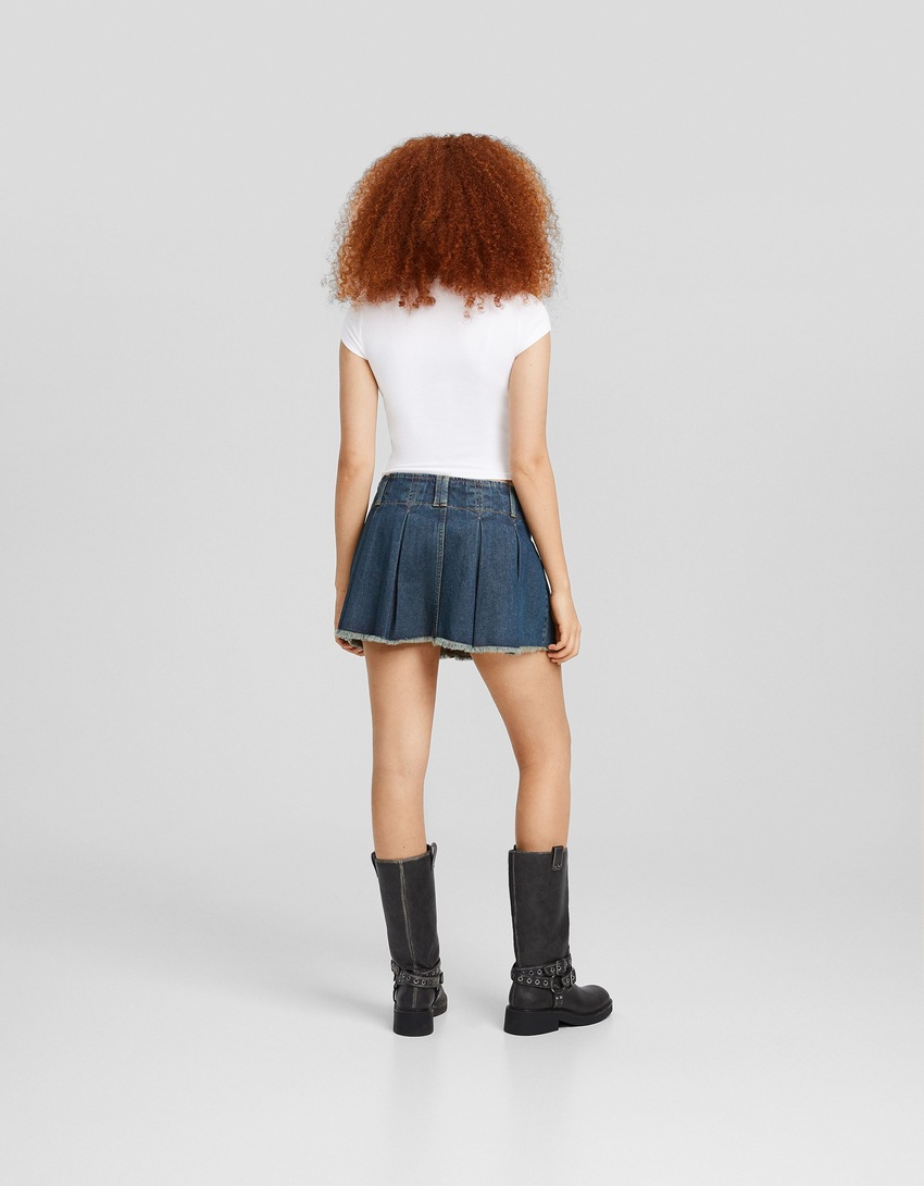 saias-calça plissadas em denim desbotado
