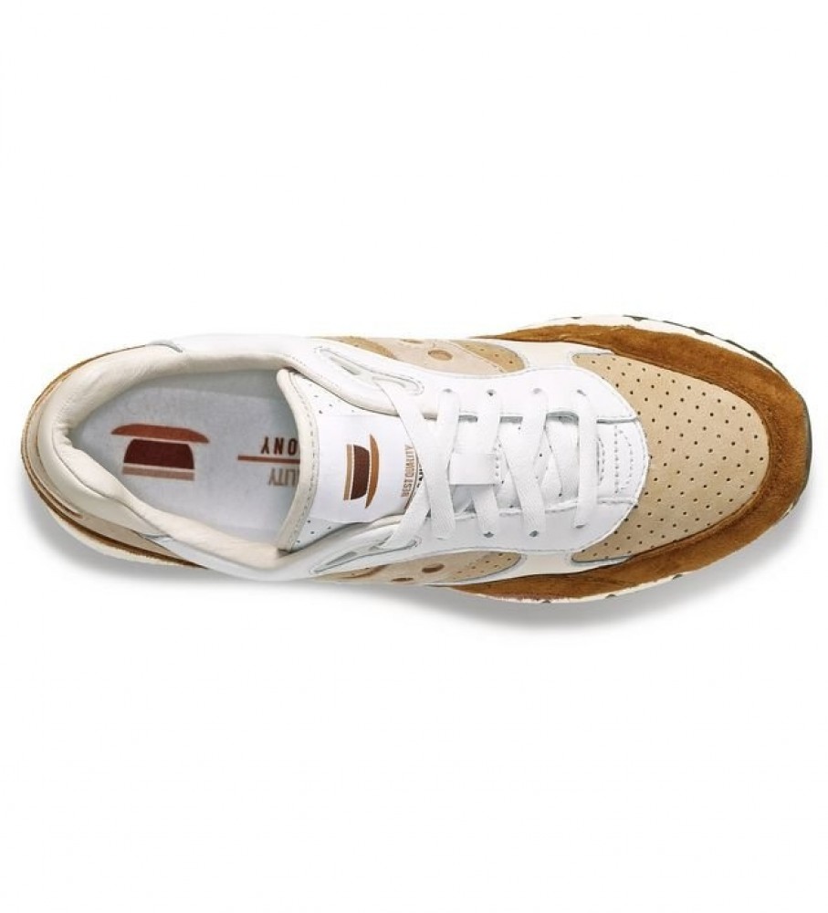 Tênis Saucony Shadow 6000 de couro, marrom e branco.