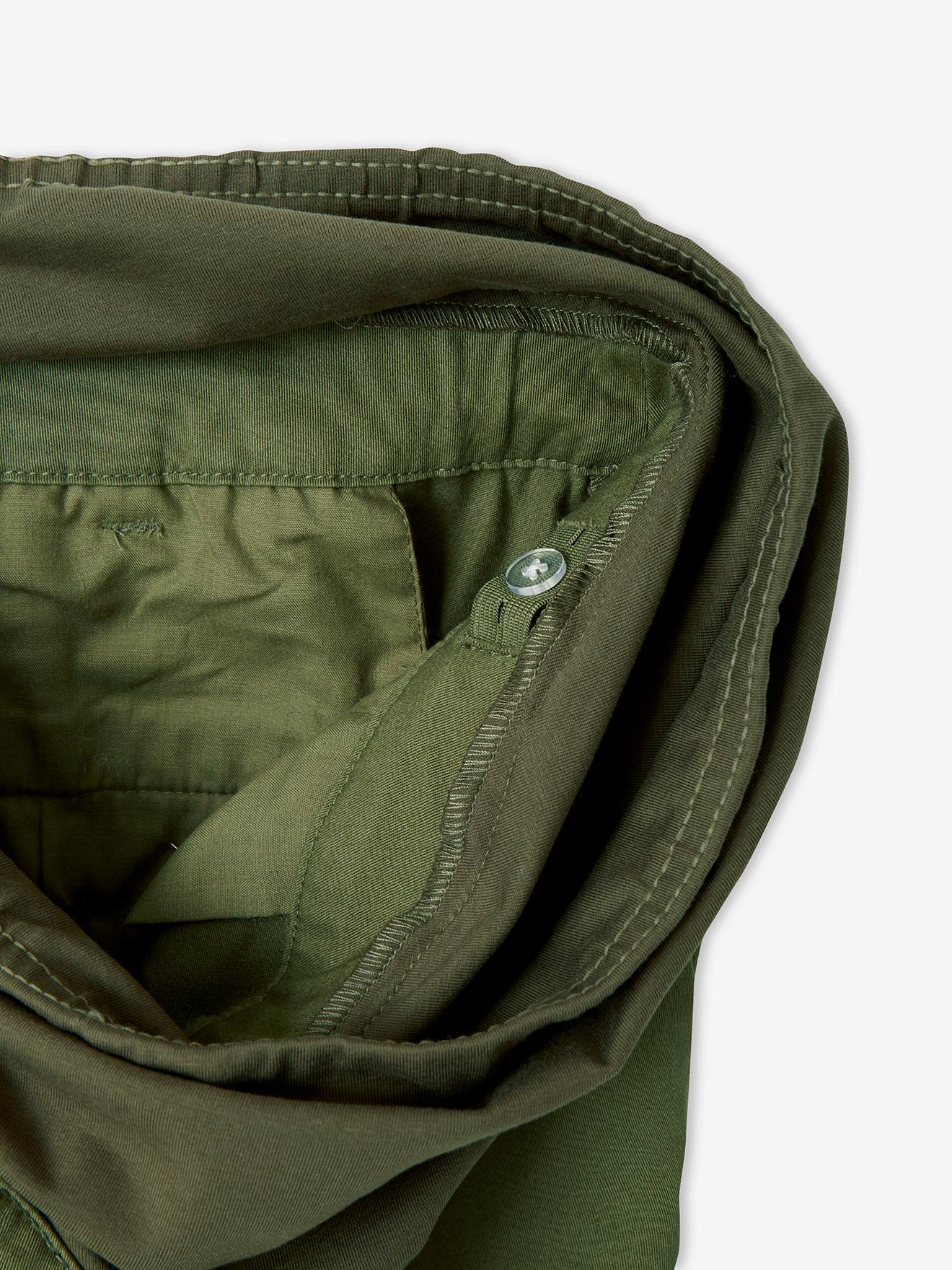 Calças chino lisas de algodão stretch verde-escuro para gestantes.