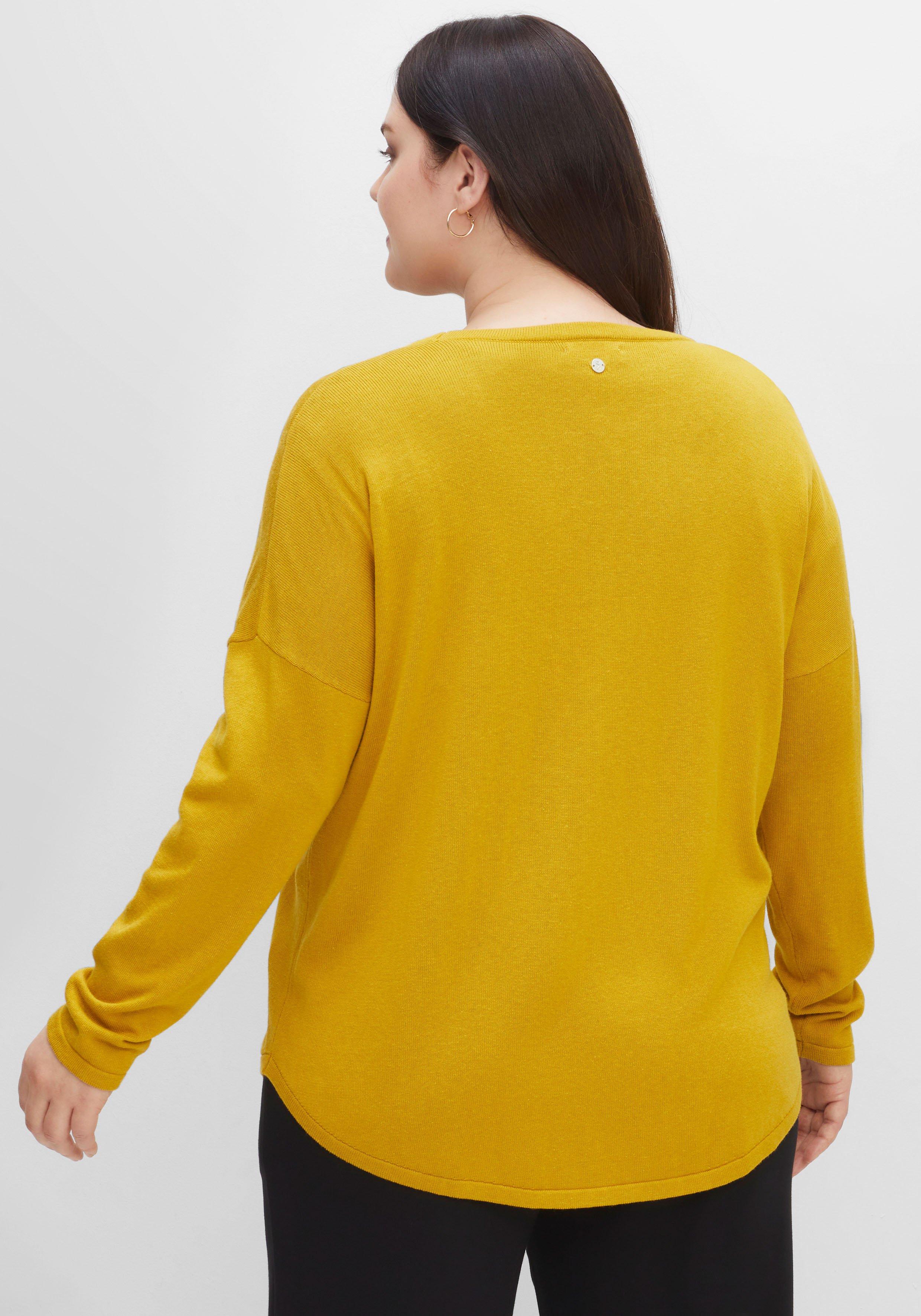 Strickjacke mit V-Ausschnitt und gerundetem Saum