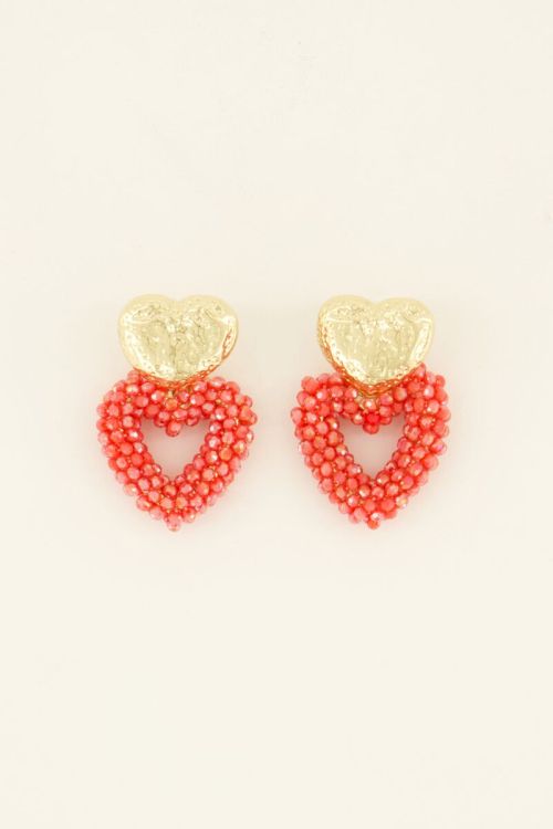 Statement hartjes oorbellen met goudkleurige knop