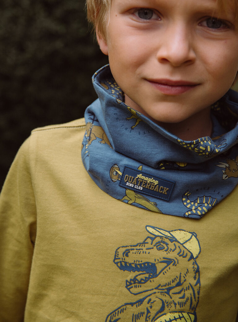 T-shirt jaune moutarde à motif dinosaure
