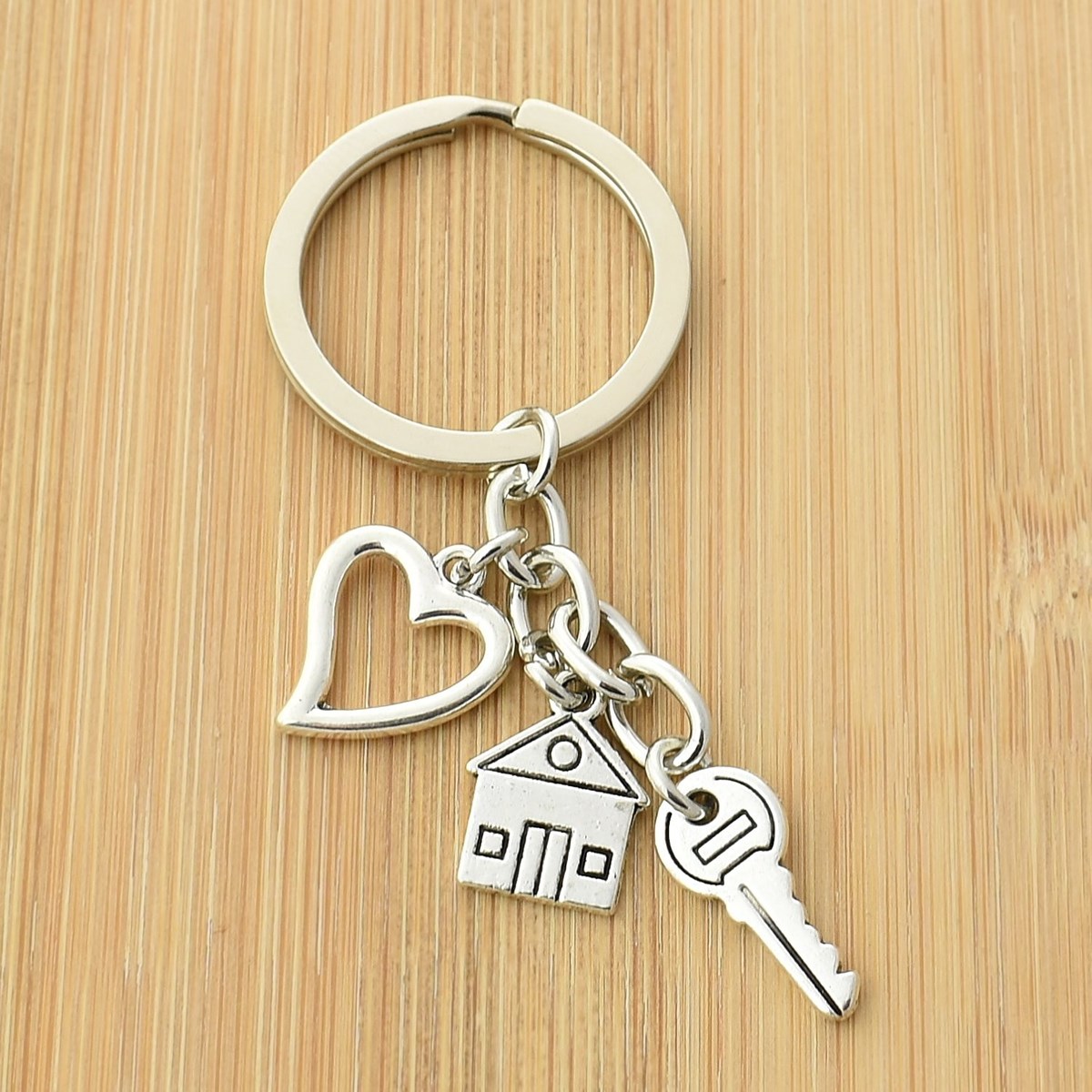 Porte-clés maison clé coeur argenté