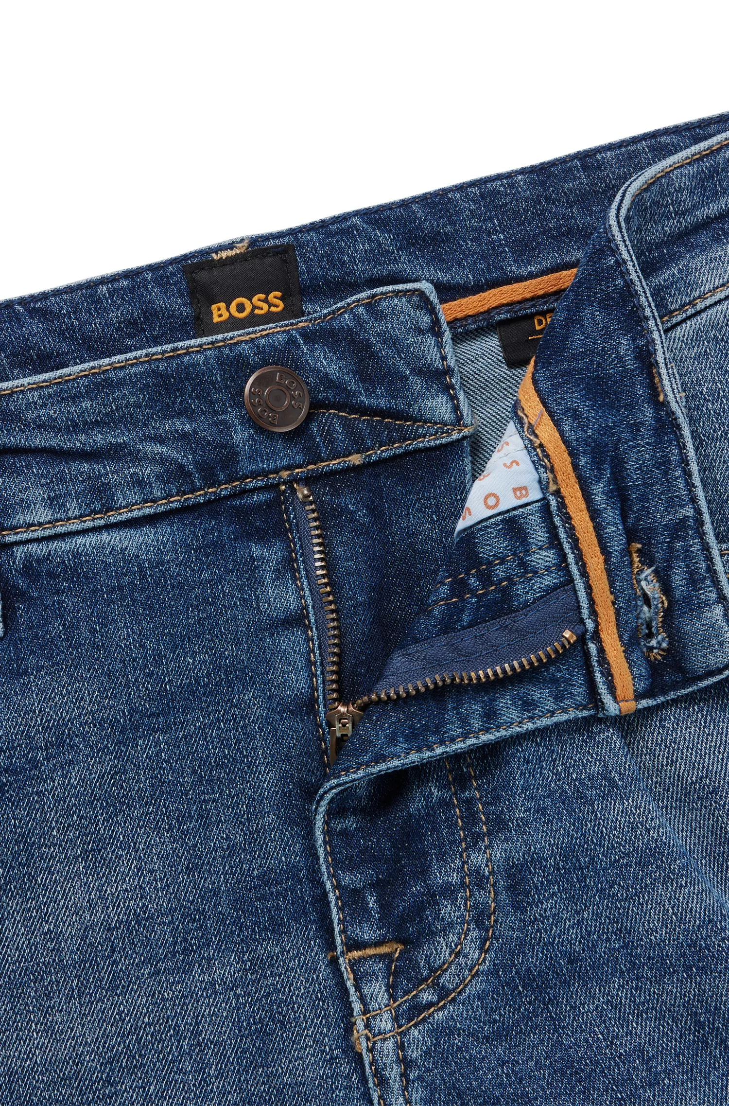Calça jeans BOSS laranja, corte slim, em denim azul com elasticidade confortável.