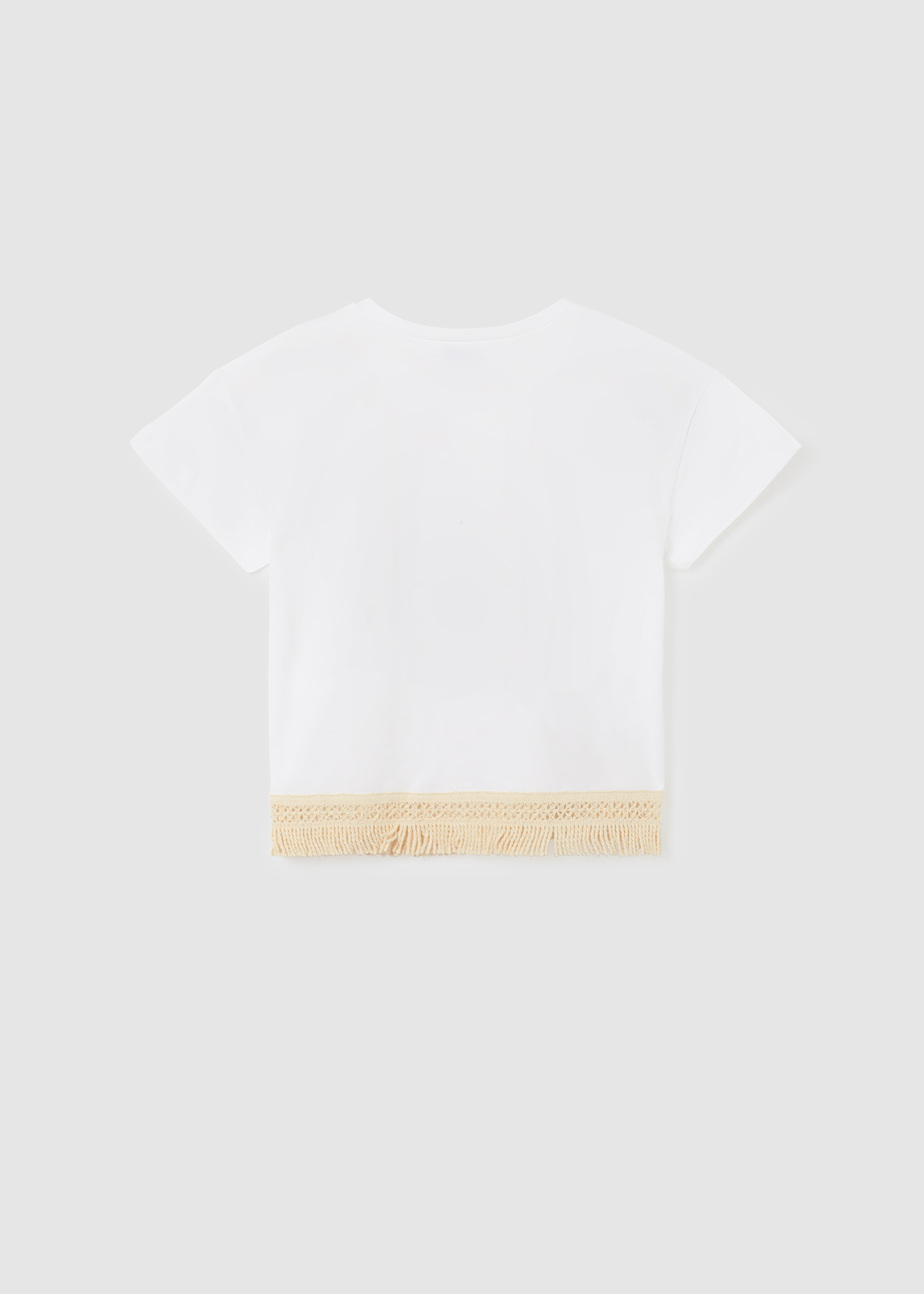 Camiseta infantil de manga curta com franjas, feita de algodão sustentável.
