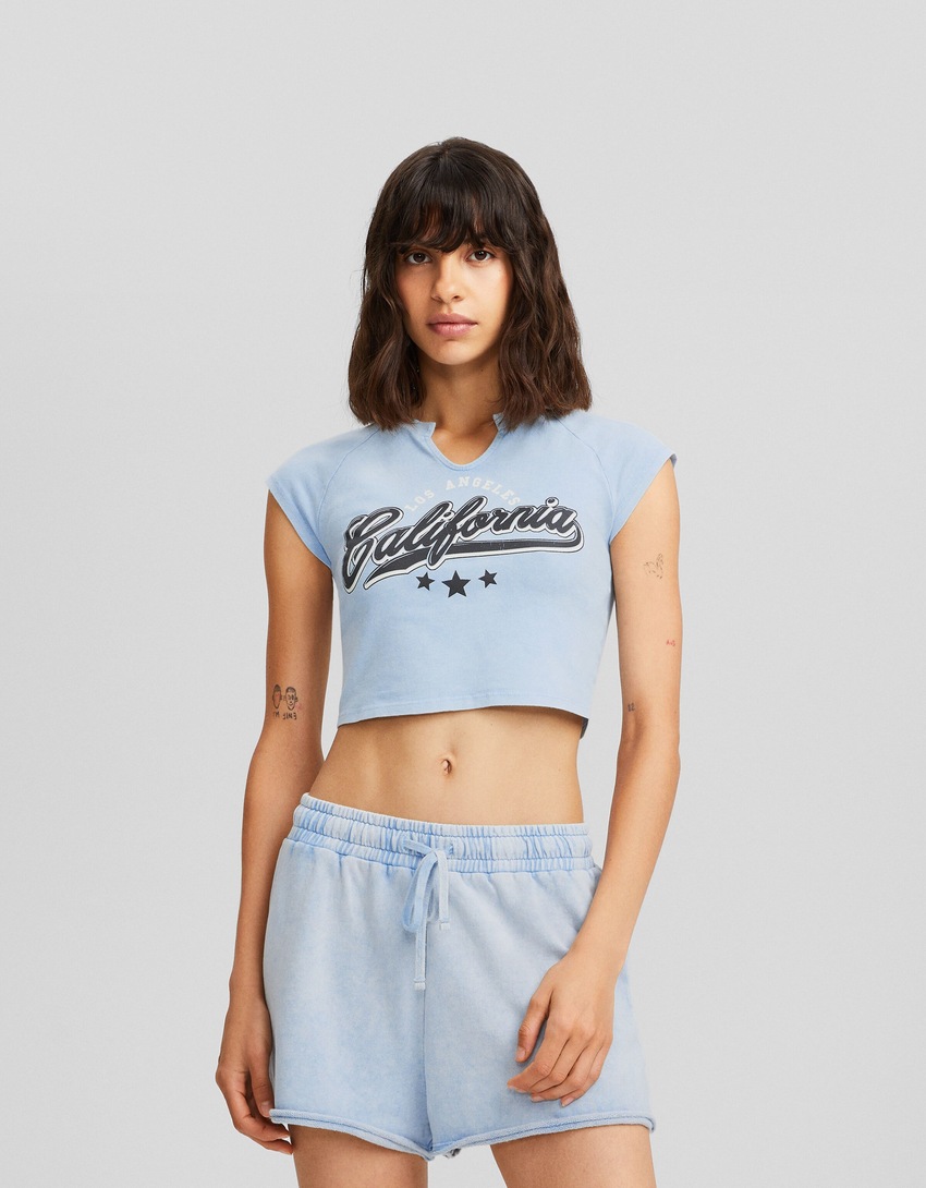Shorts de pelúcia com efeito desbotado
