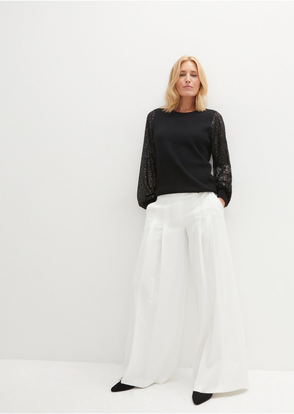Pull avec manches pailletées