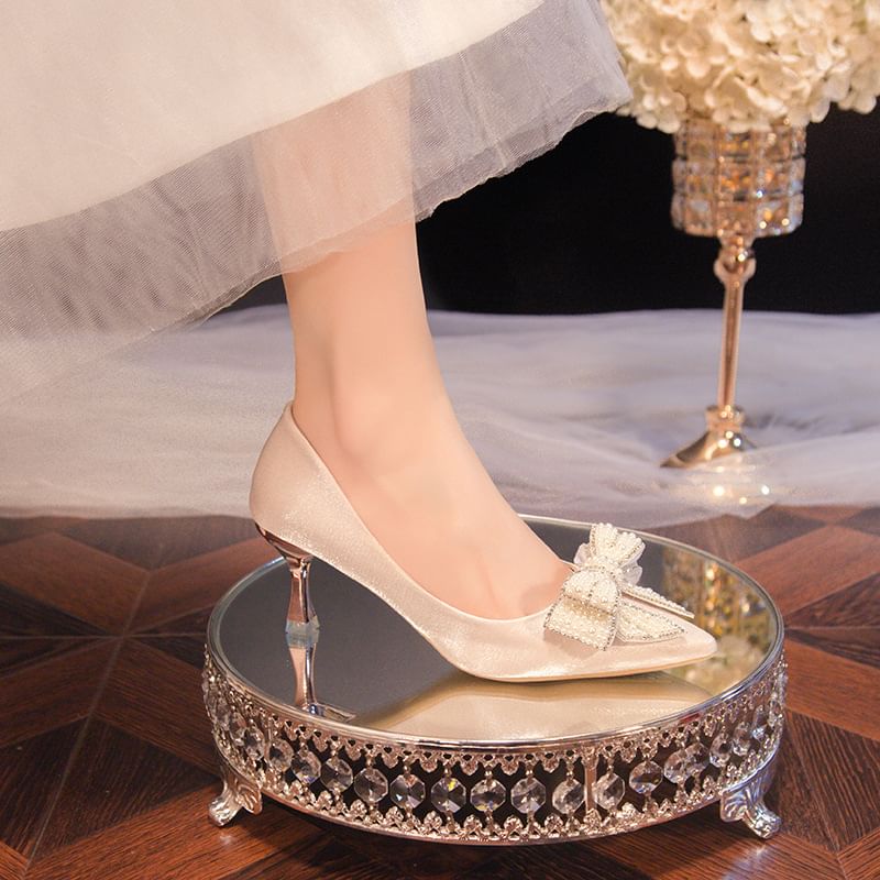 Silverslyre - Pumps met puntige neus en strik van imitatieparels en strass