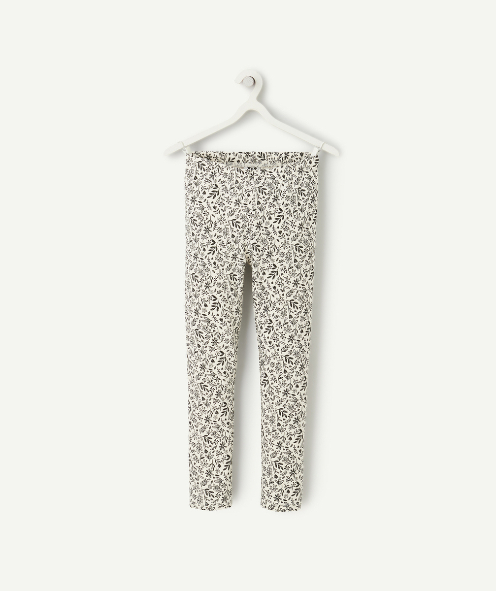 legging fille en coton bio blanc avec imprimé fleurs et feuilles noir
