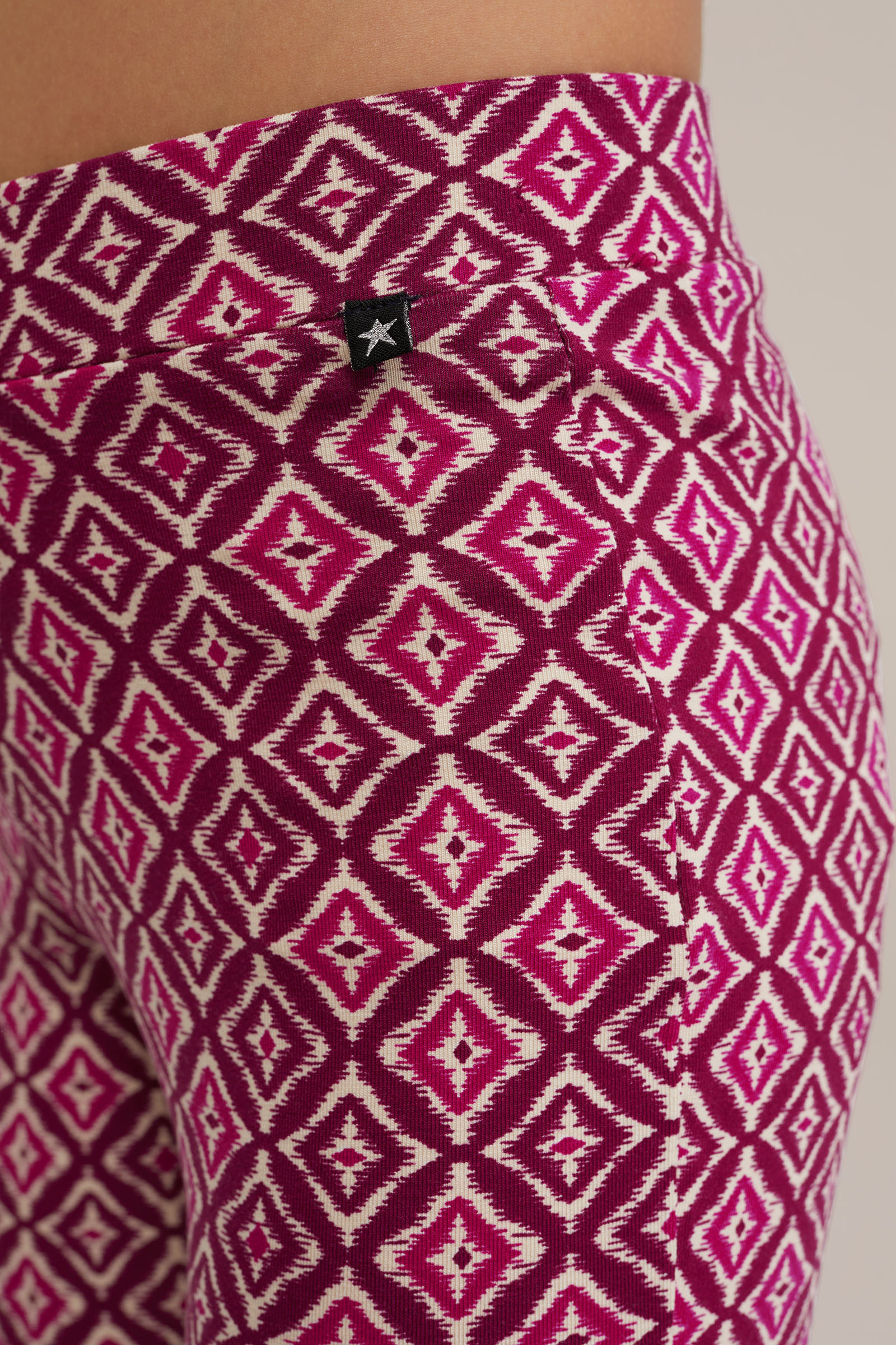 Meisjes flared legging met dessin WE Fashion Roze