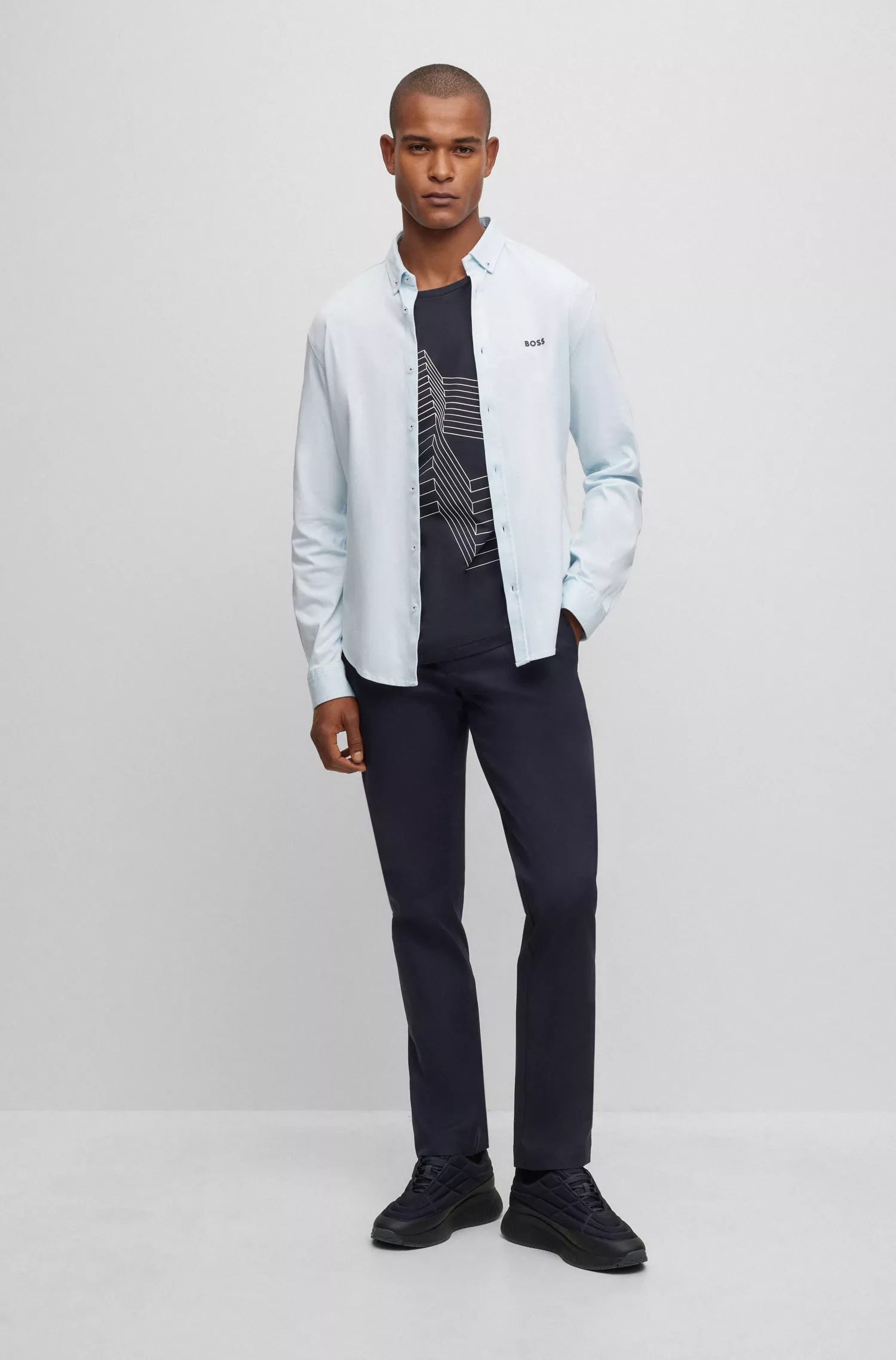 Camisa BOSS verde de botões, corte regular, em malha piqué de algodão.