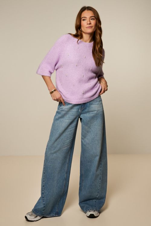 Blauwe wide leg jeans met schuine zoom