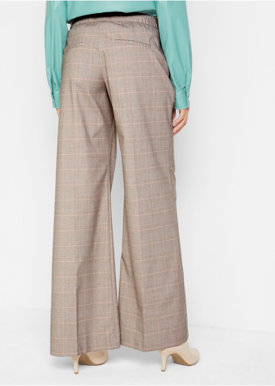 Pantalon à carreaux avec sangle décorative