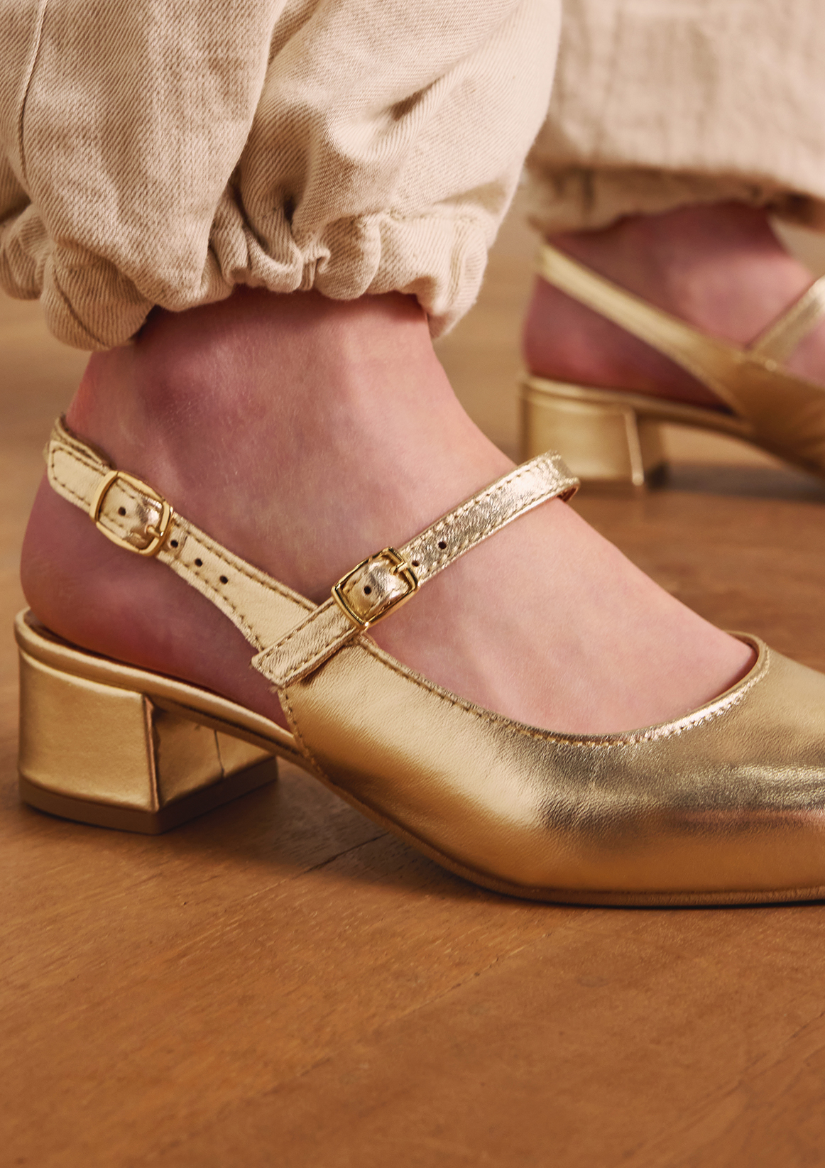 Gouden leren slingbacks