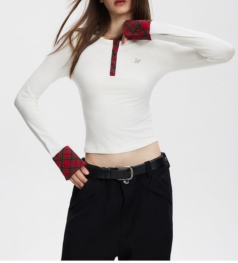 Rosesand - Slim-fit gebreide top met lange mouwen en halve knopen en geruit paneel