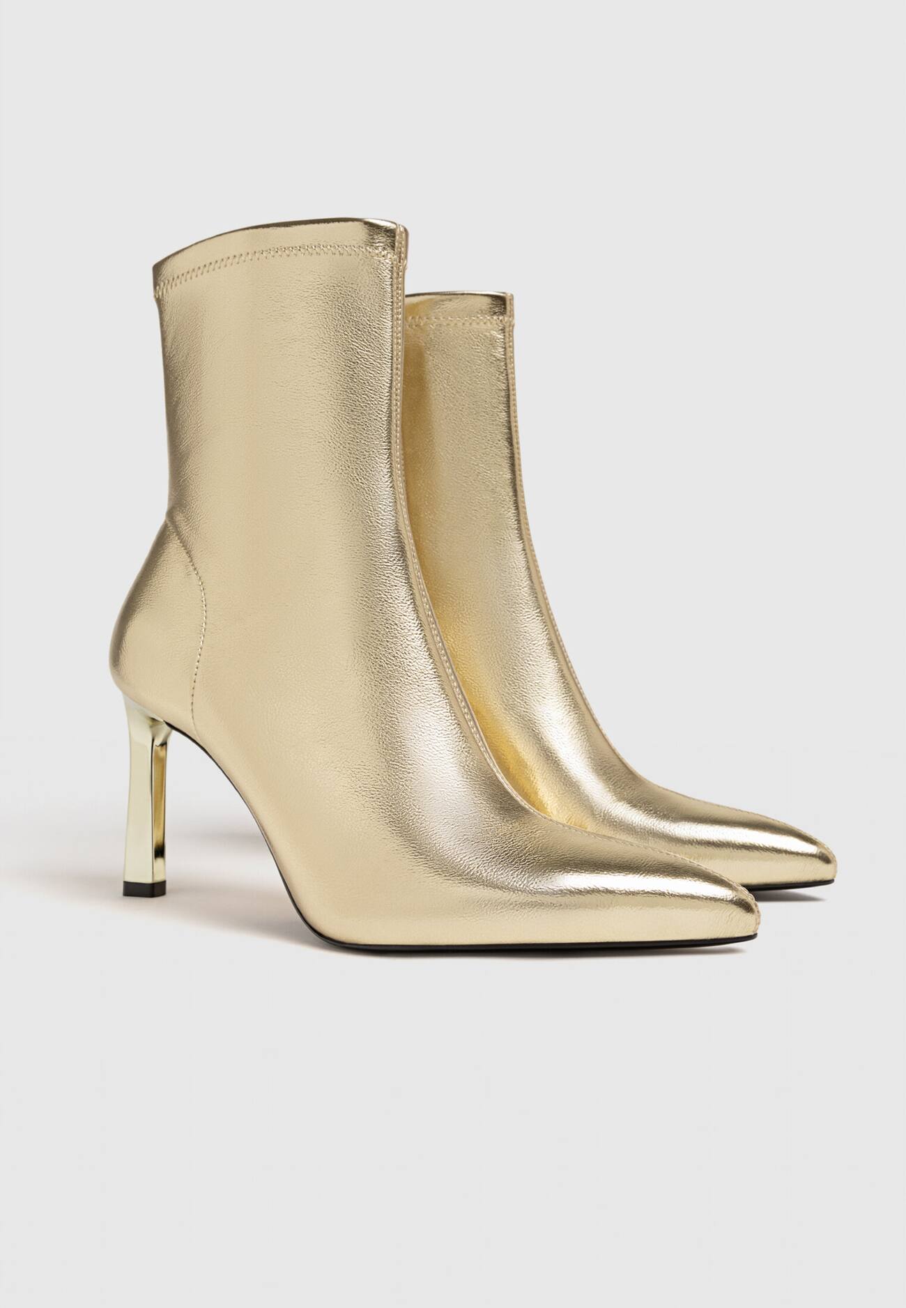 botas de cano curto douradas com salto alto elástico