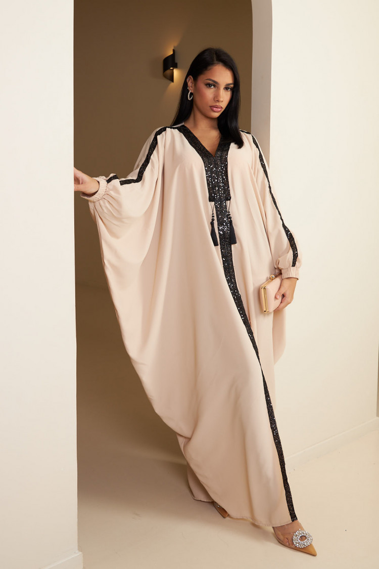Abaya beige à empiècement sequins et pompom noir