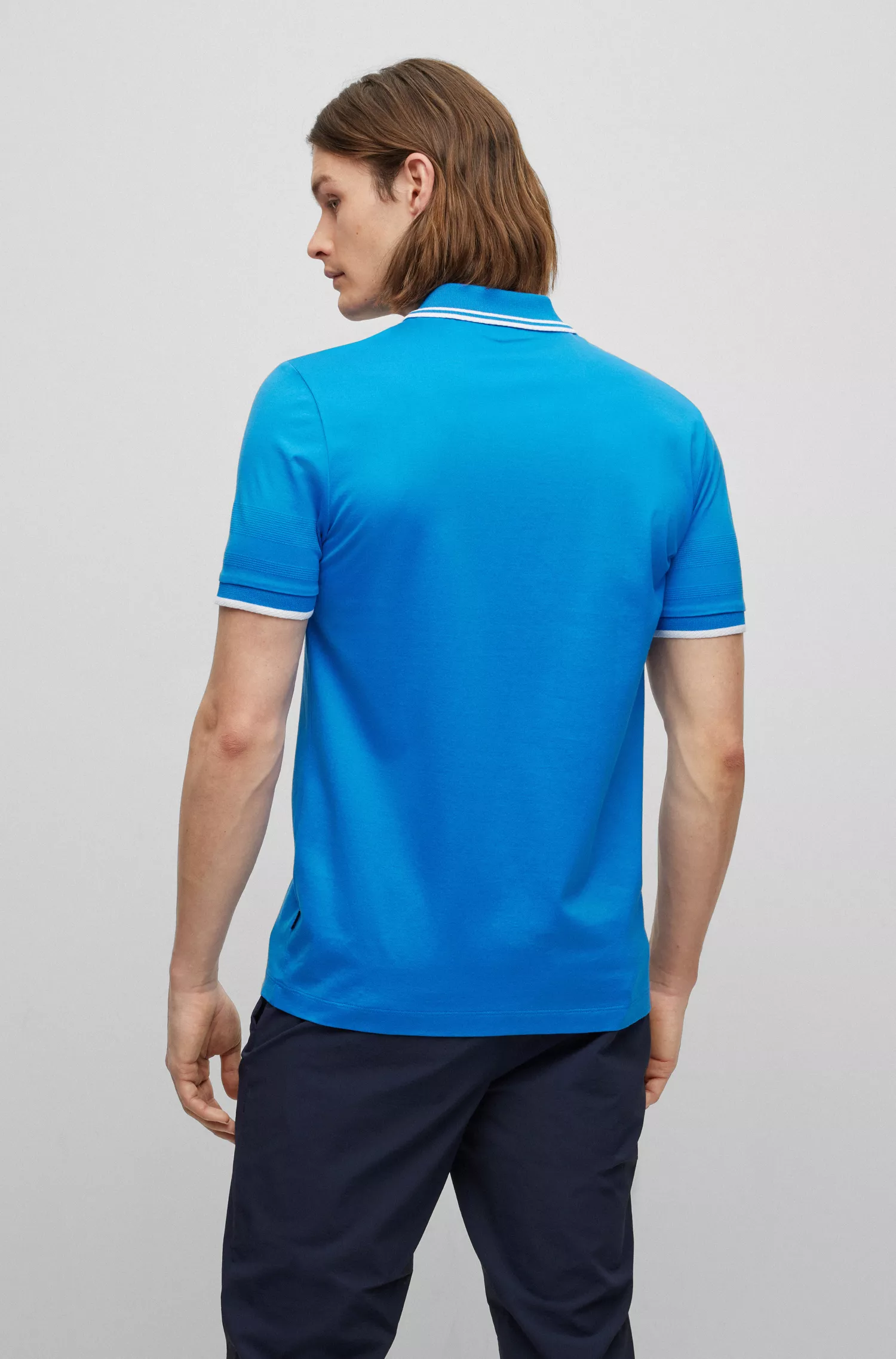 Camisa polo BOSS preta de algodão interlock com corte slim e listras jacquard.