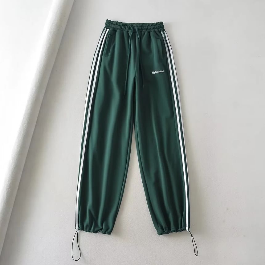 Reknovine - Wijde joggingbroek met trekkoord en gestreepte letters