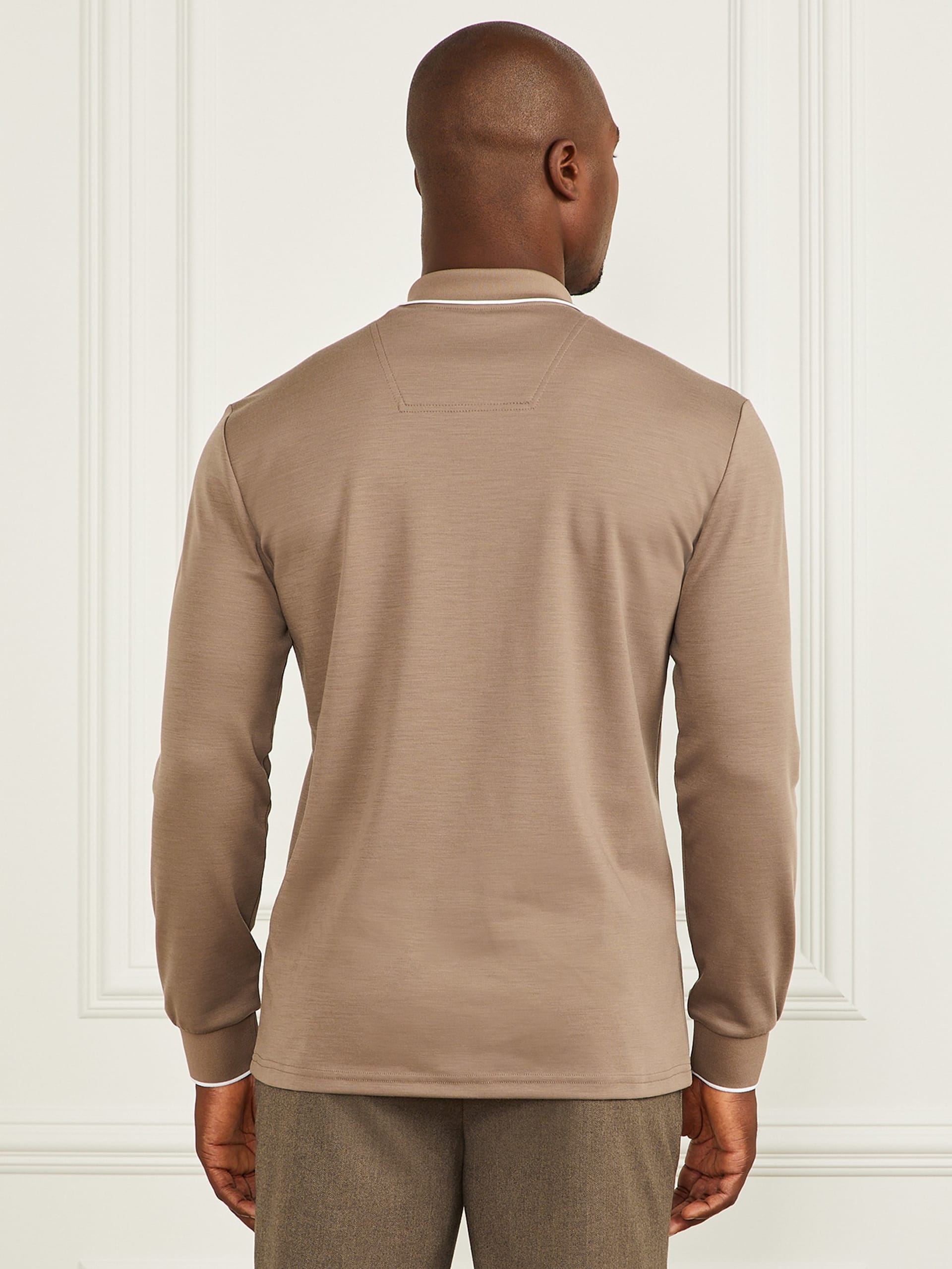 Polo de manga comprida com zíper