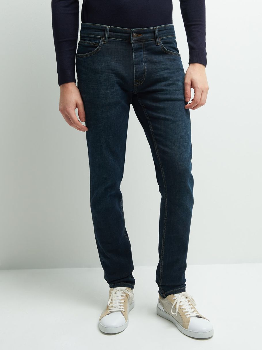 Jean regular en coton élasthane délavé