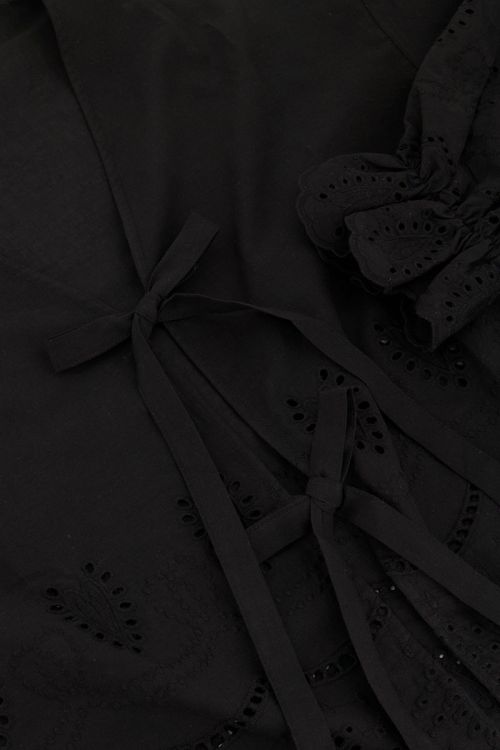Zwarte blouse met strikjes en broderie