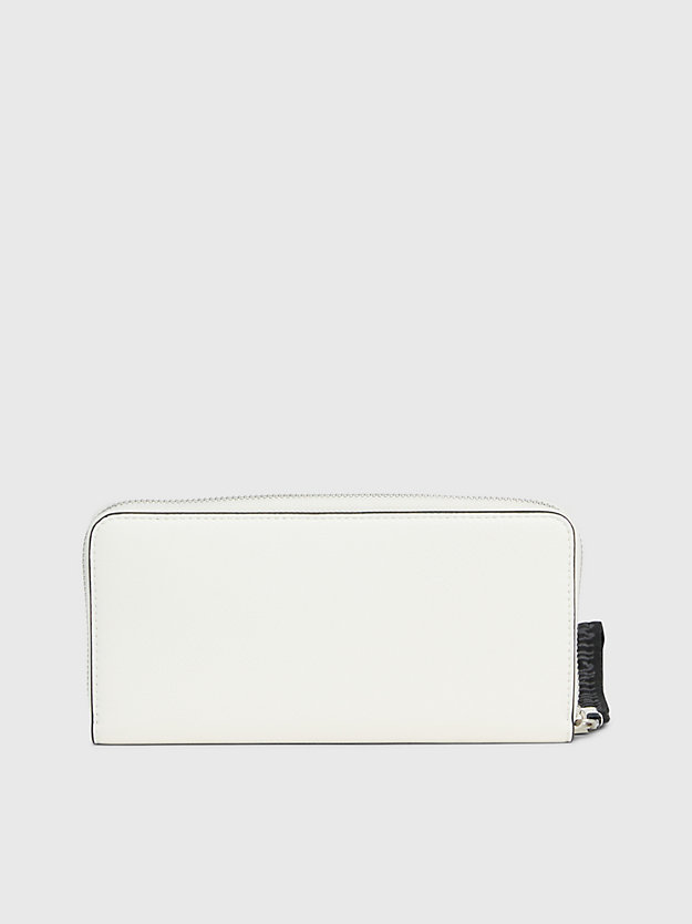Carteira com zíper completo e porta-moedas de pulso com proteção RFID.