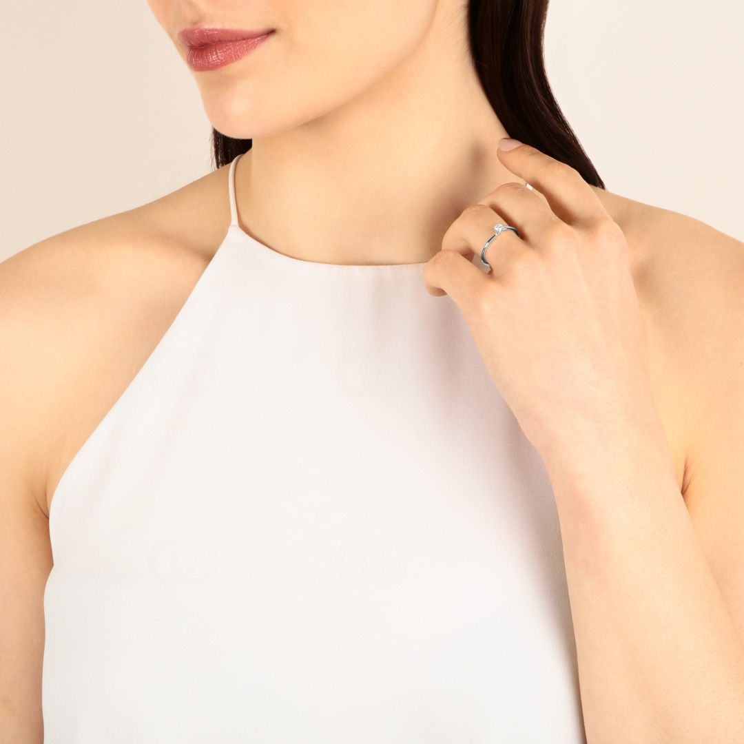 Solitärring 750/18 K Weissgold mit Diamant 0.12ct H/Si