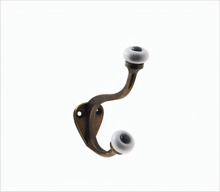 Patère en zamak effet rouillé à fixer 1 tête en porcelaine Bar Plus