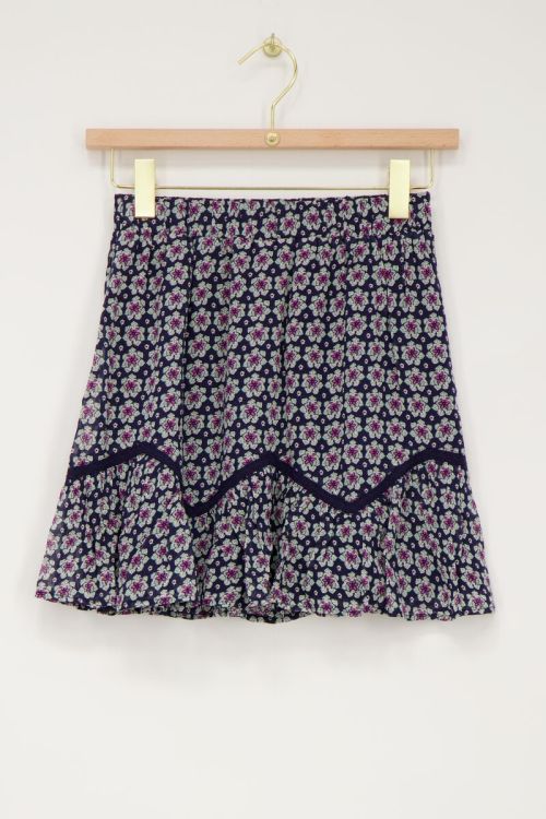Donkerblauw rokje met bloemenprint en ruffles