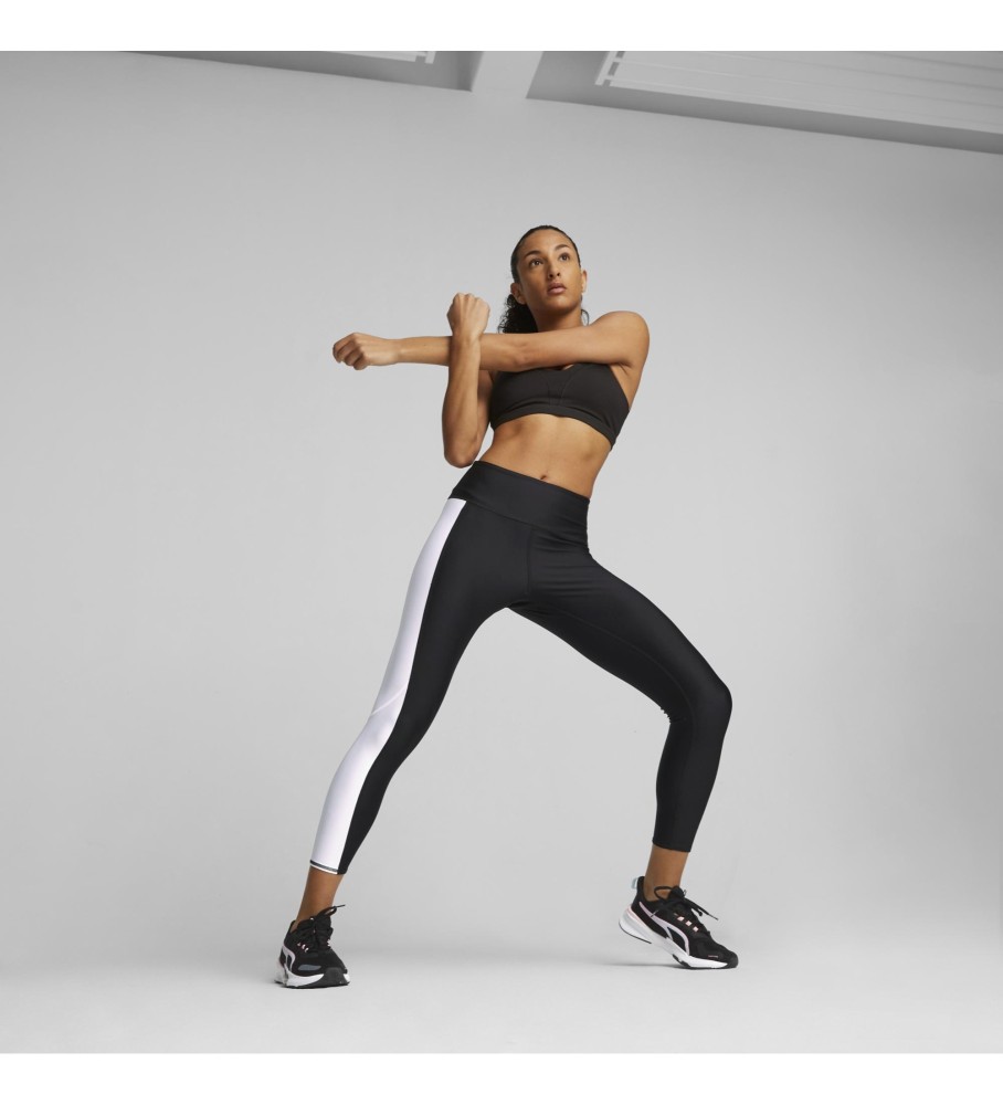 Calça legging de treino Puma Fit de cintura alta, preta e branca.