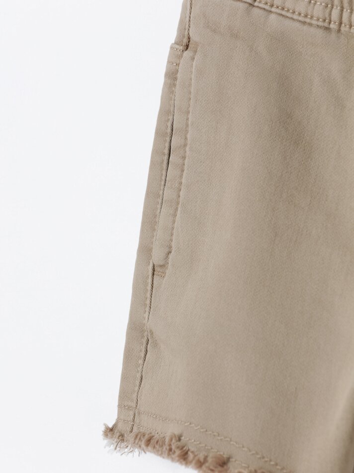 Bermuda jeans com rasgos - Corda
