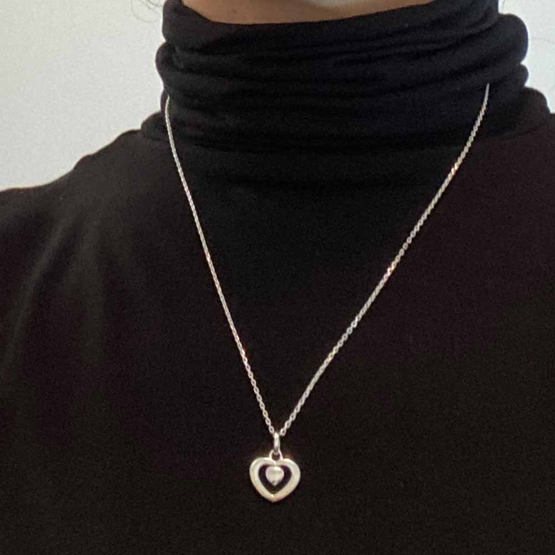 Pendentif coeur avec petit coeur dedans