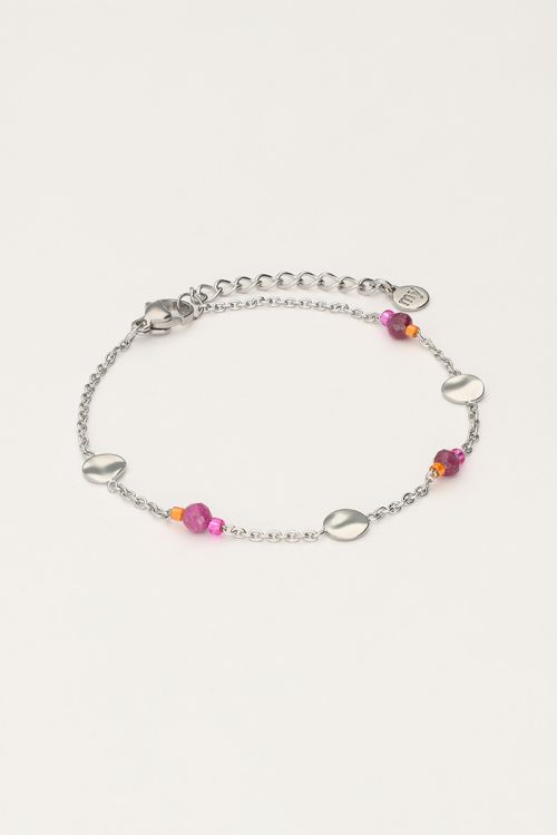Armband met munt en paarse kralen