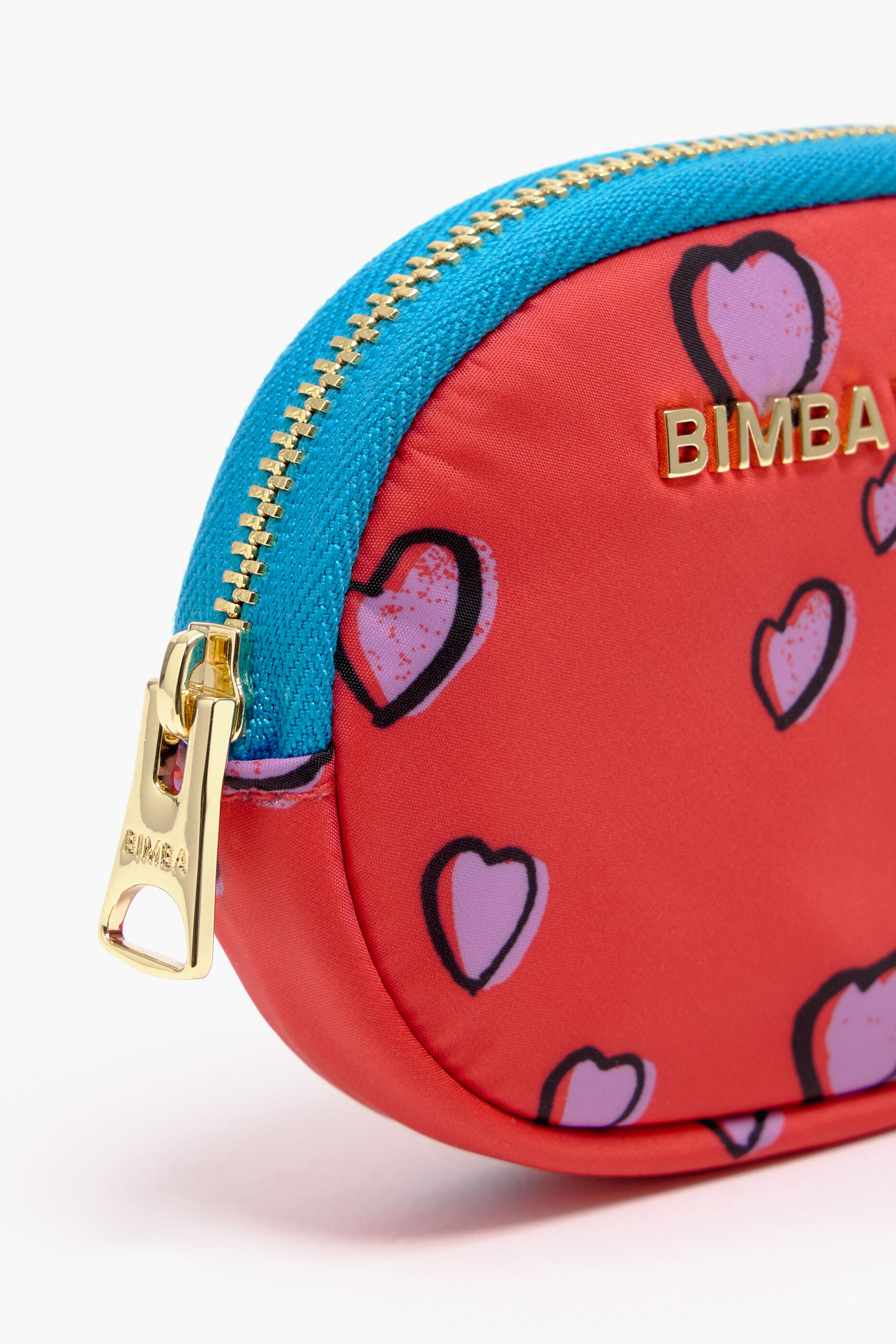 Porta-moedas oval com estampa de pequenos corações, vermelho