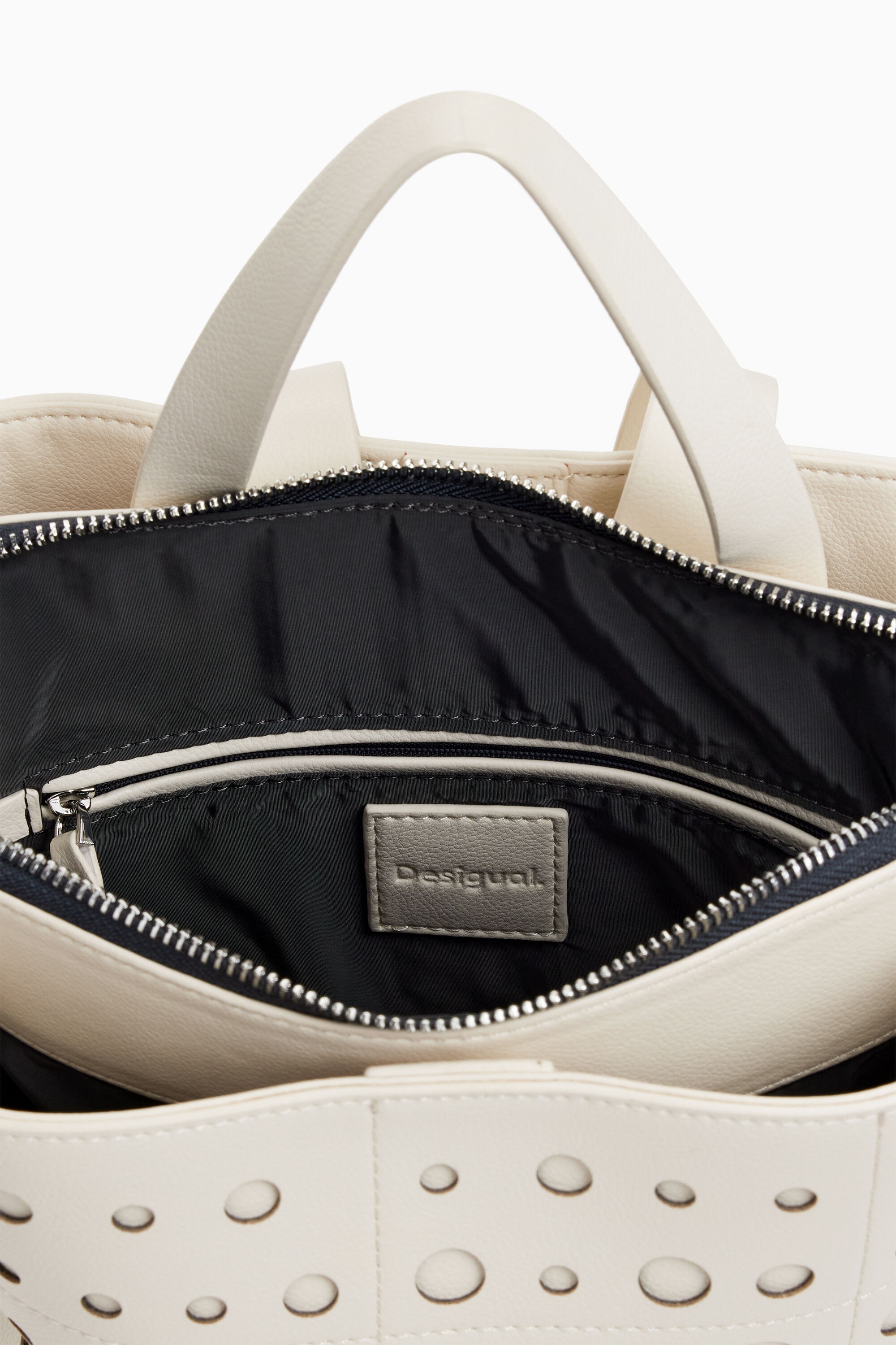 Mochila de couro sintético com círculos