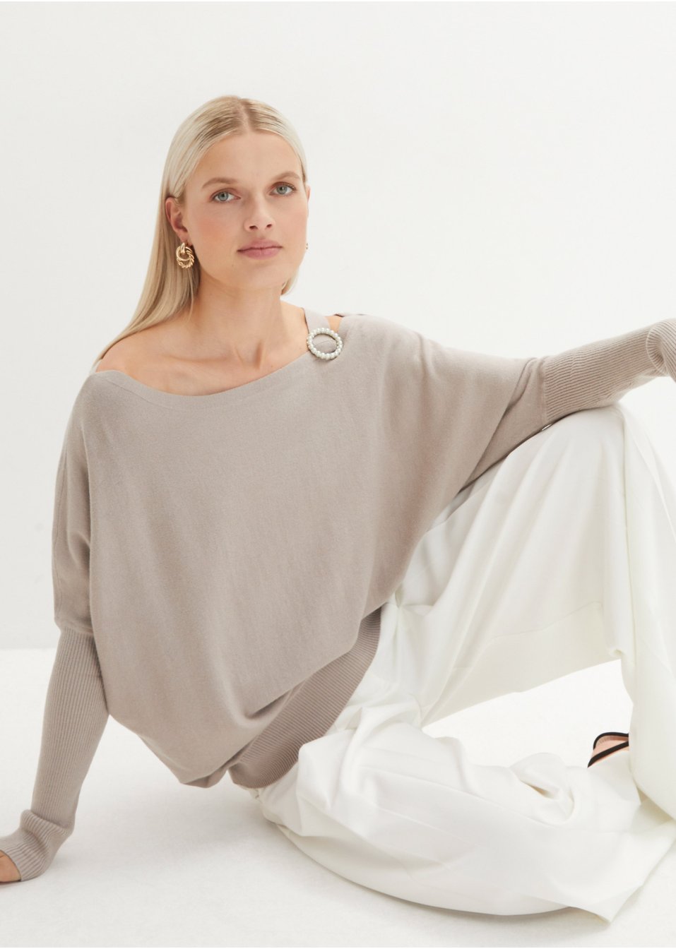Pull avec élément décoratif