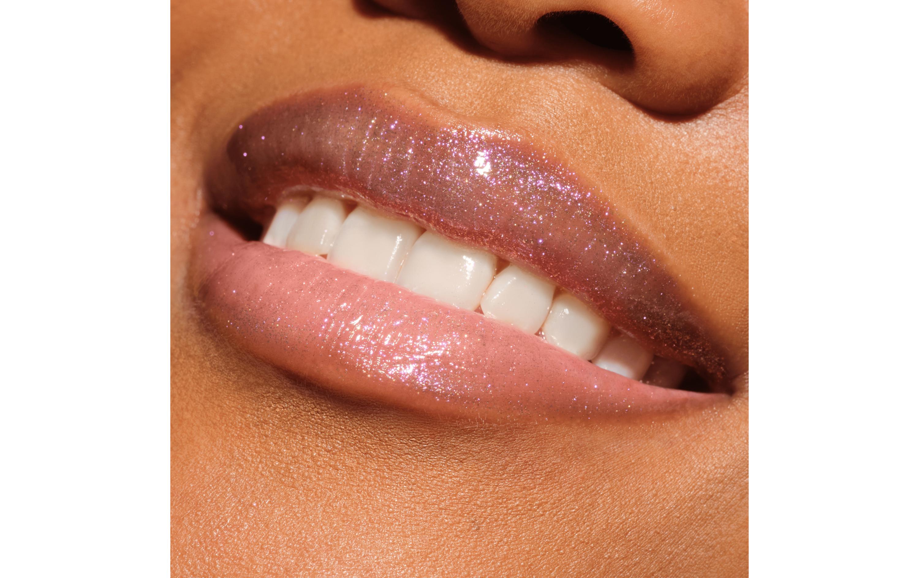 Lip Gloss Diamond Glaze 010 Bubbles N TroublesGlänzender, glitzernder Lipgloss in transparentem Farbton
