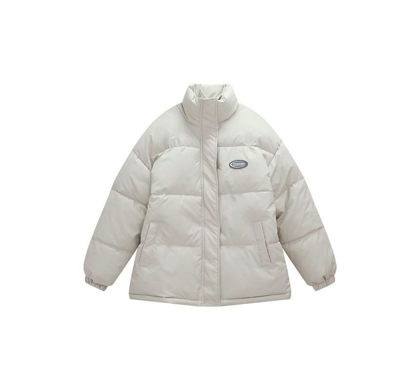 Sienne - Effen pufferjack met rits en appliqué