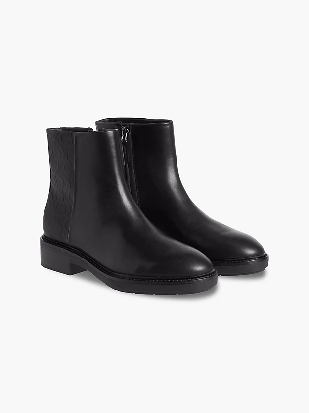 botas de couro até o tornozelo