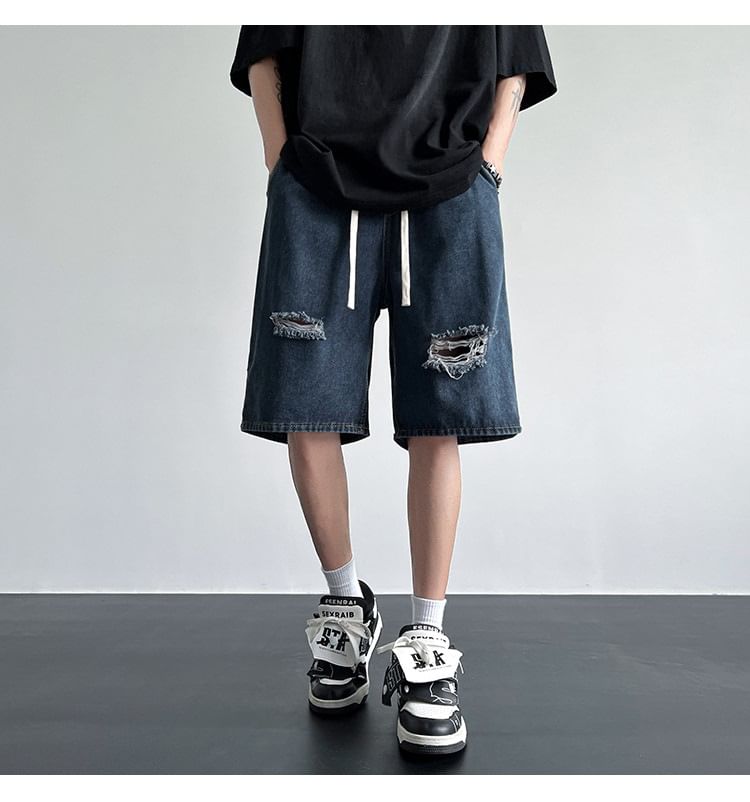 Femilina - Hoge taille denim shorts met distressed effect