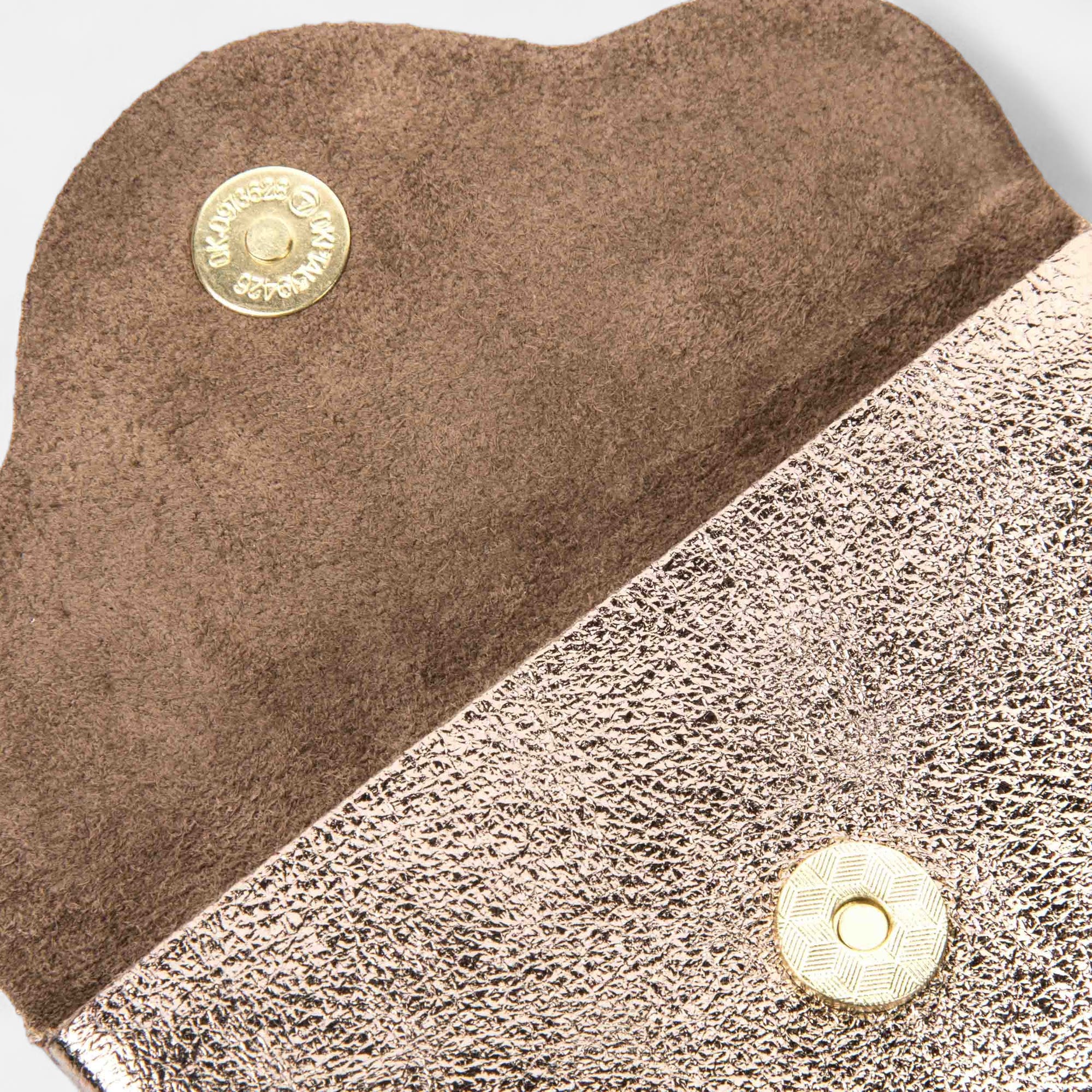 Petite maroquinerie en cuir bronze