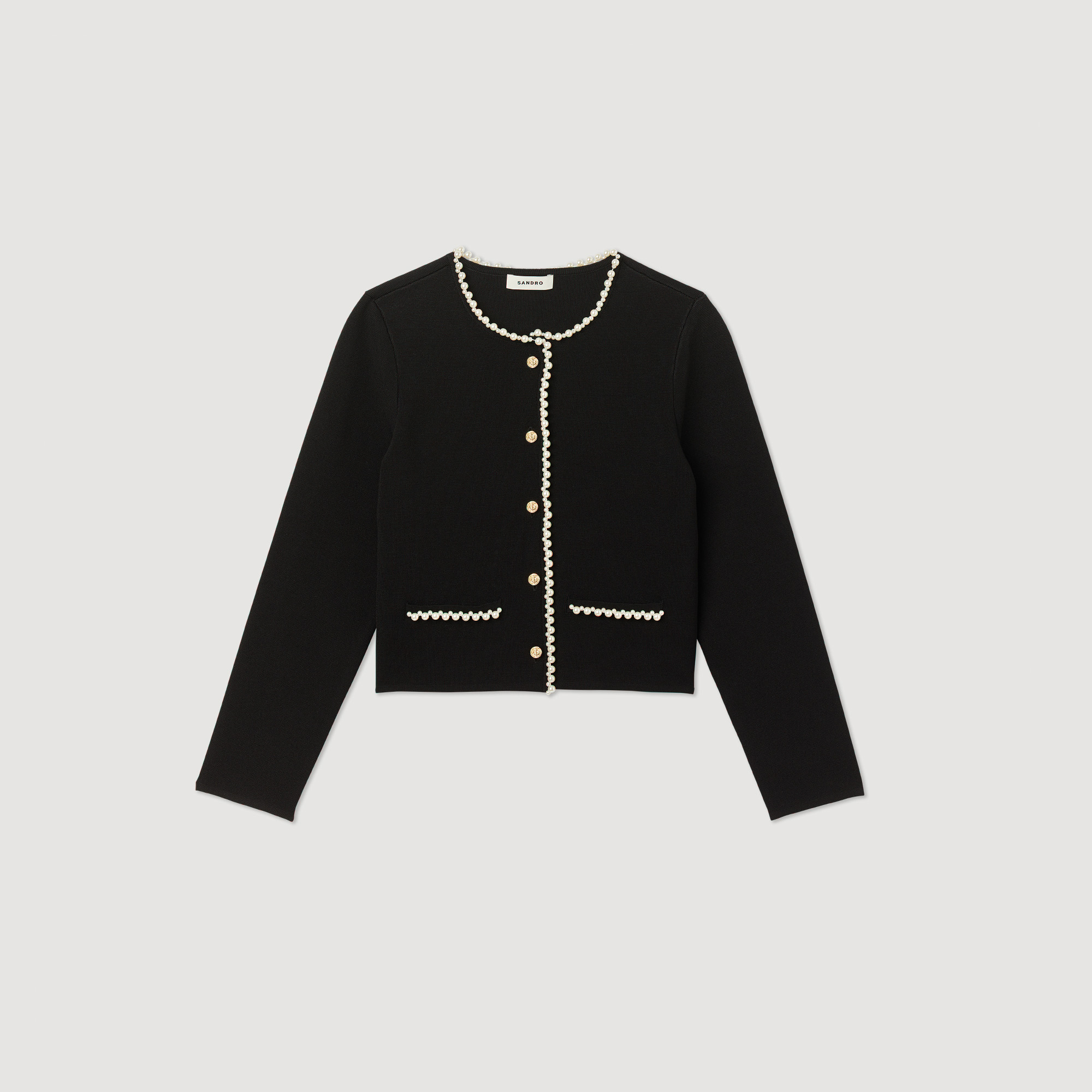 Veste ornee de perles